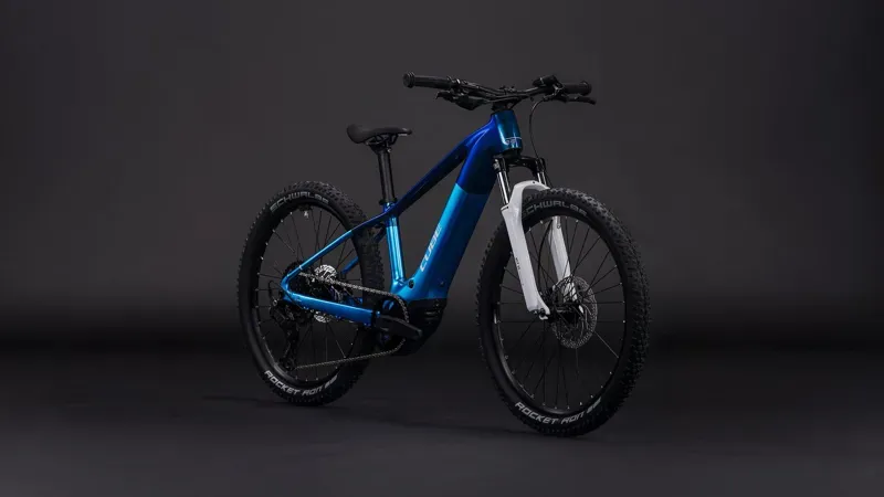 Cube Acid 240 Hybrid Rookie Pro 400x E-Kids Bike In Actionteam-1